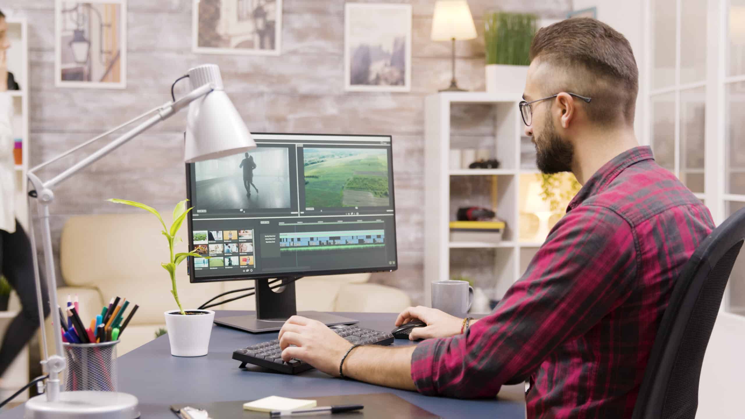 man editing in computer