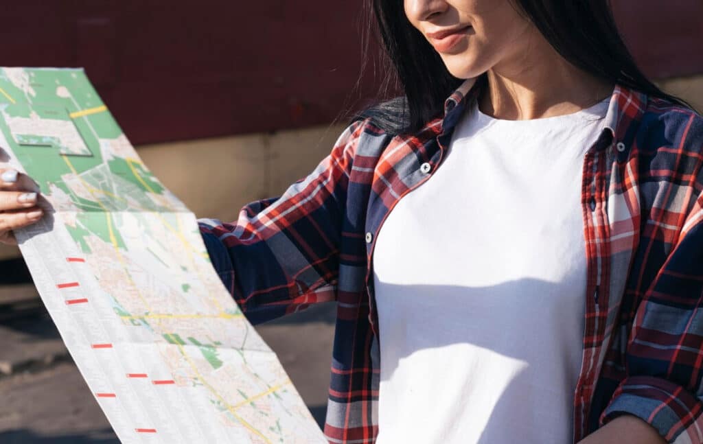 girl holding a map