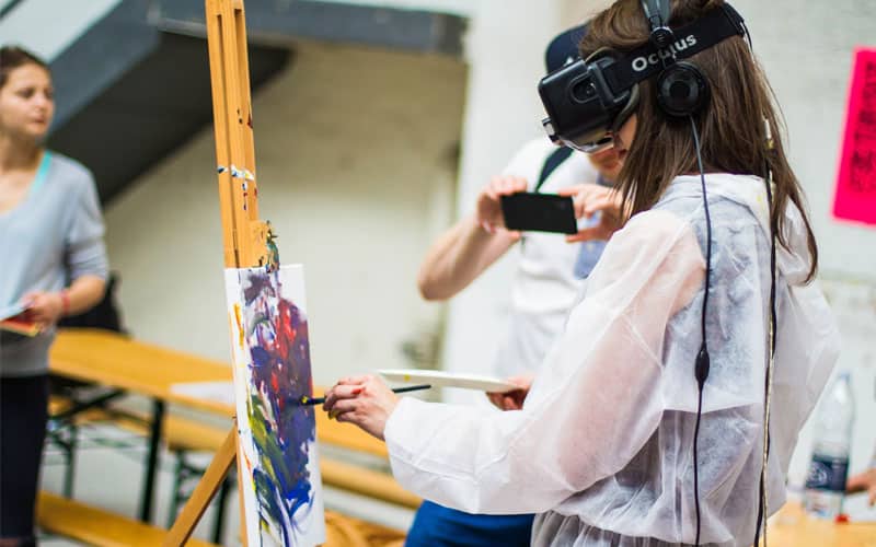 girl using ar while painting