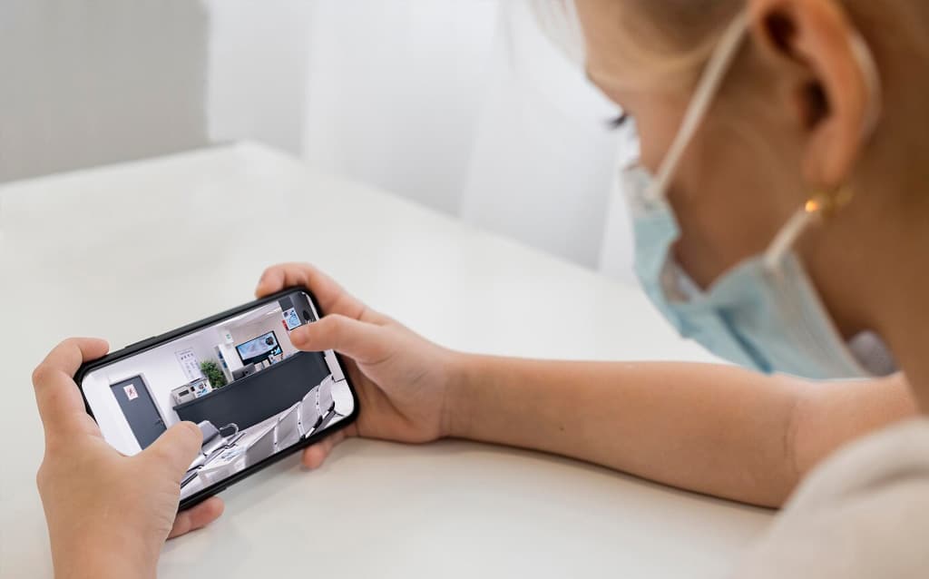 patient holding phone