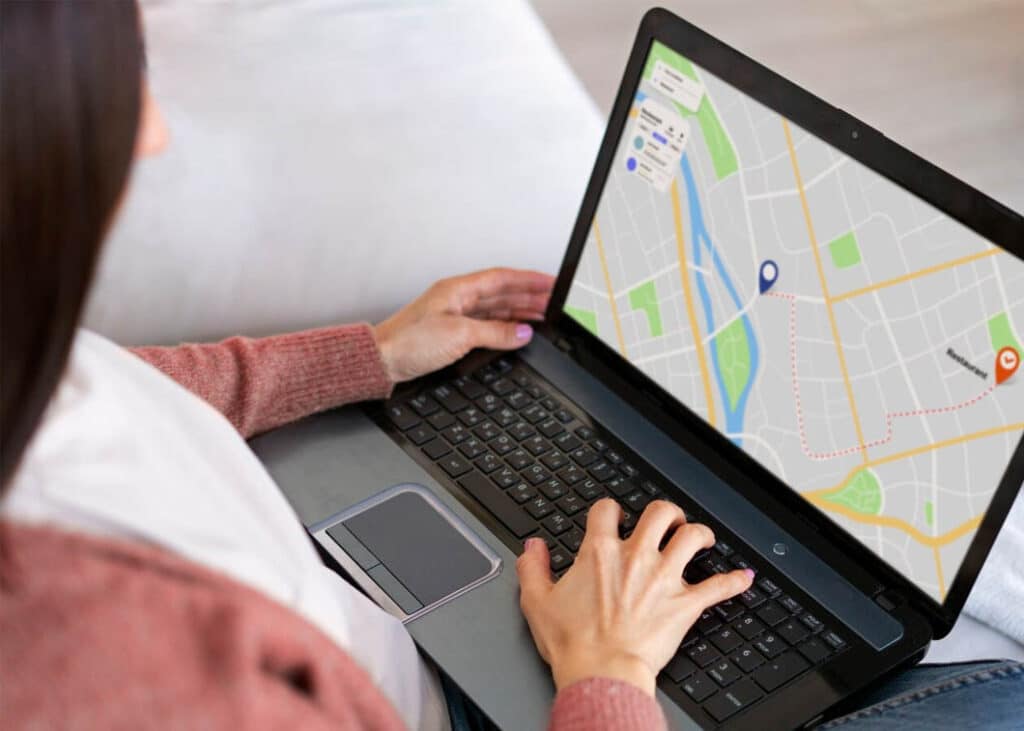 woman holding laptop