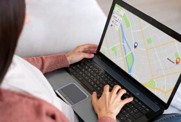 woman holding laptop
