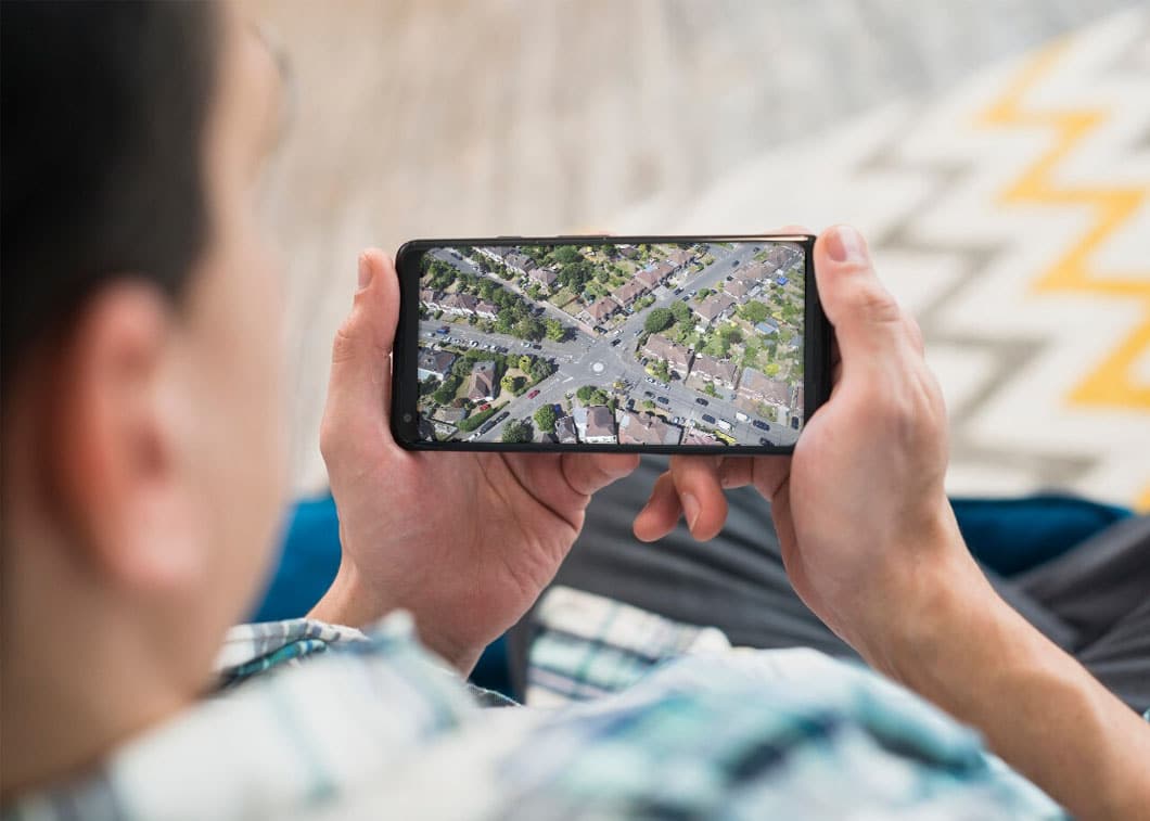 man watching at phone