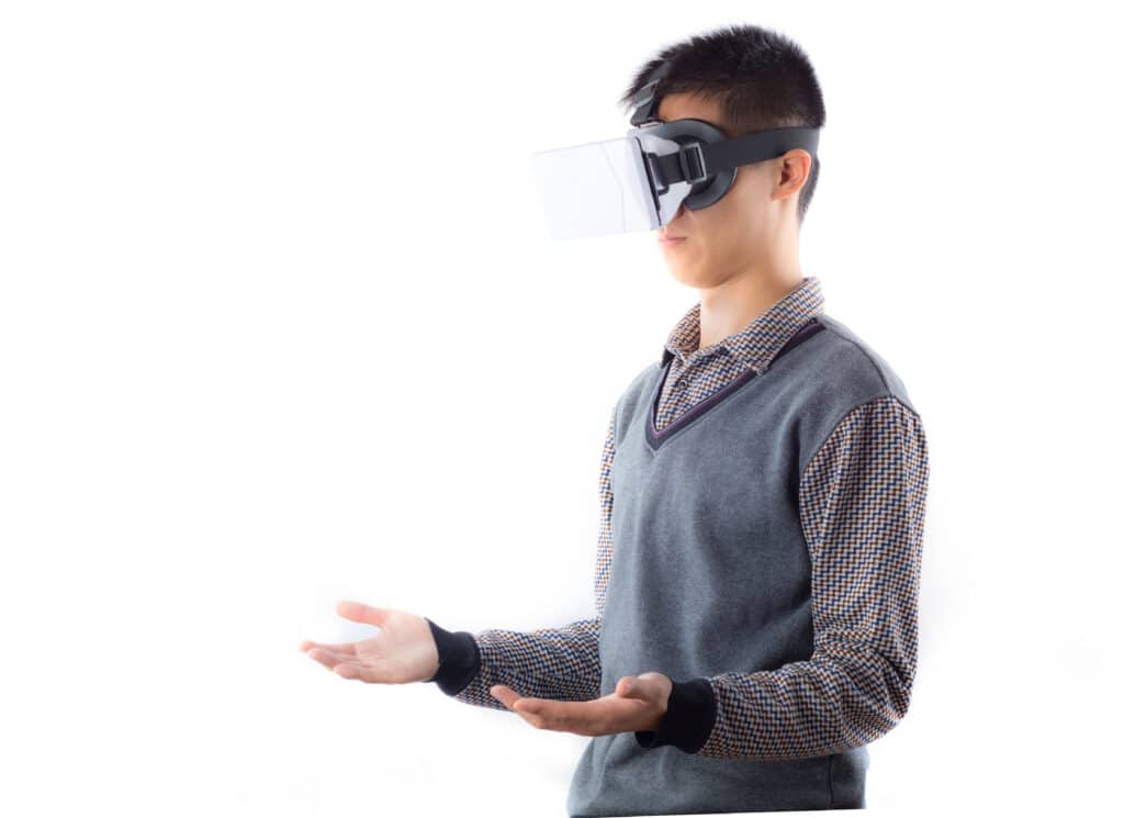 man standing wearing vr